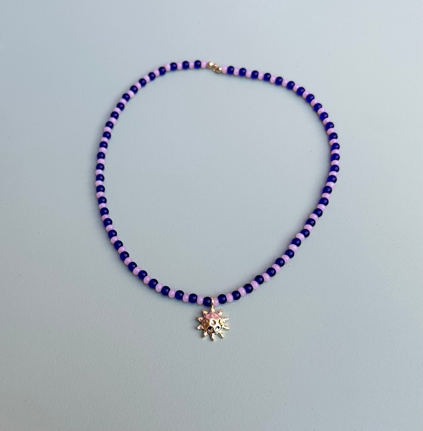 Light Pink and Royal Glass Beaded necklace with Sun Pendant
