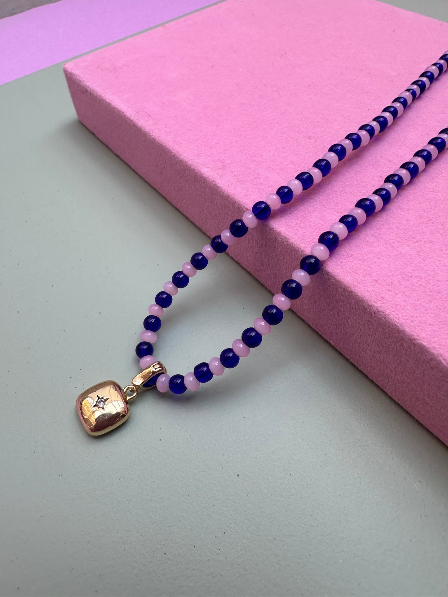 Stripy Beaded necklace with a detachable charm